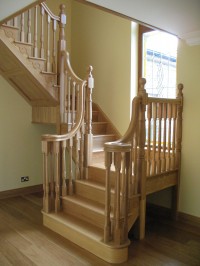 Oak Cut String Staircase With Double Scroll Handrails by Haughey Joinery, Co. Donegal